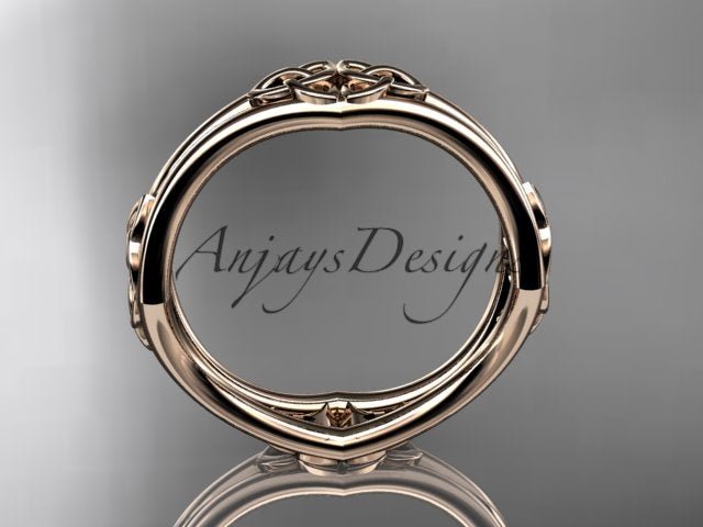 14K rose gold Celtic trinity knot wedding band showing the circular inner band and underside.
