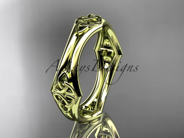14K yellow gold Celtic trinity knot wedding band shown at an angle, displaying its openwork design.