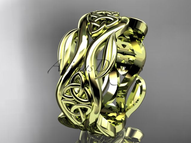 14K yellow gold Irish Celtic wedding band with trinity knot and flowing leaf details, shown at an angle.