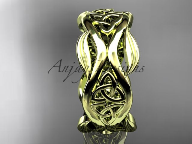 14K yellow gold Irish Celtic wedding band with trinity knot and flowing leaf details, shown at an angle.