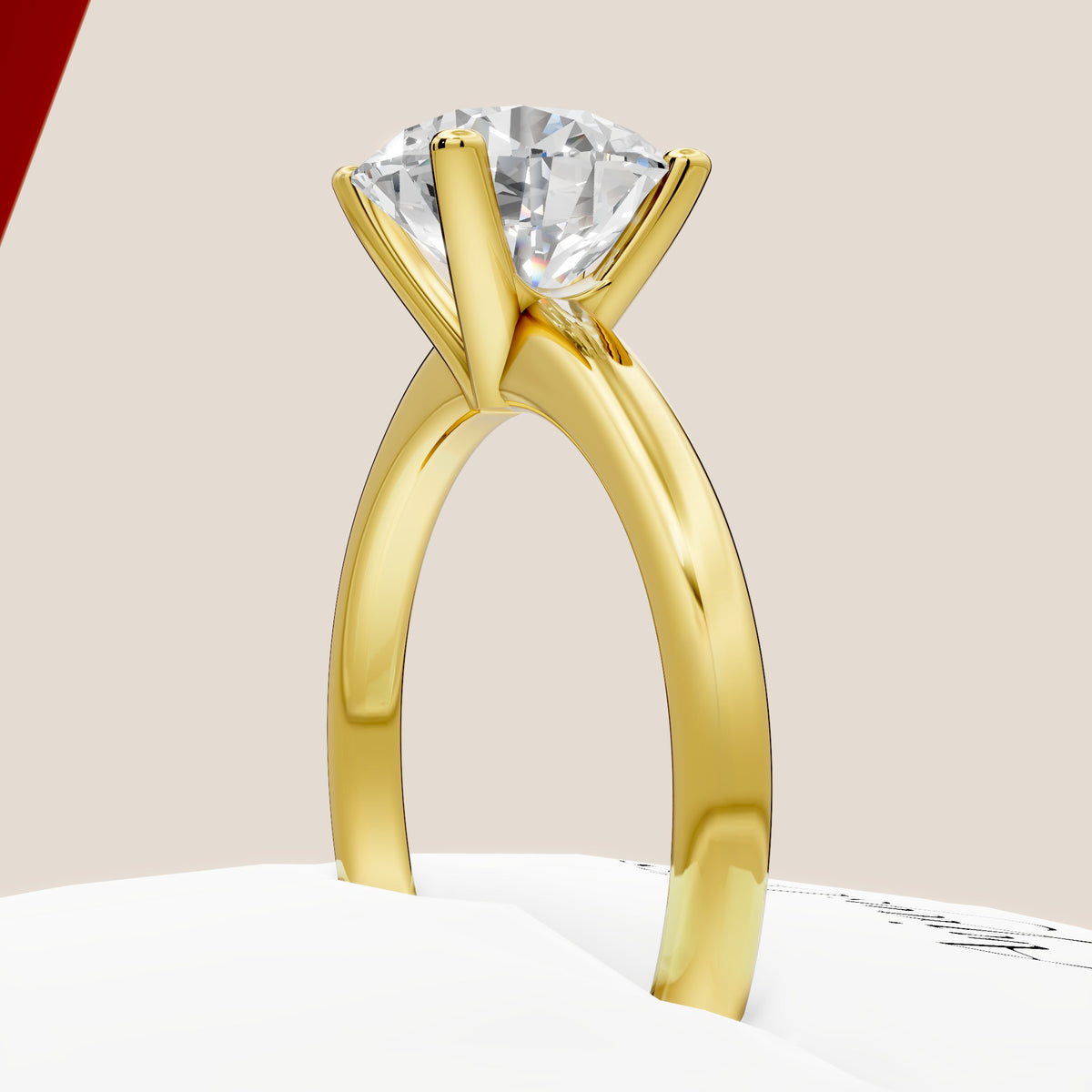 4 prong solitaire engagement ring with round lab grown diamond in 14k yellow gold