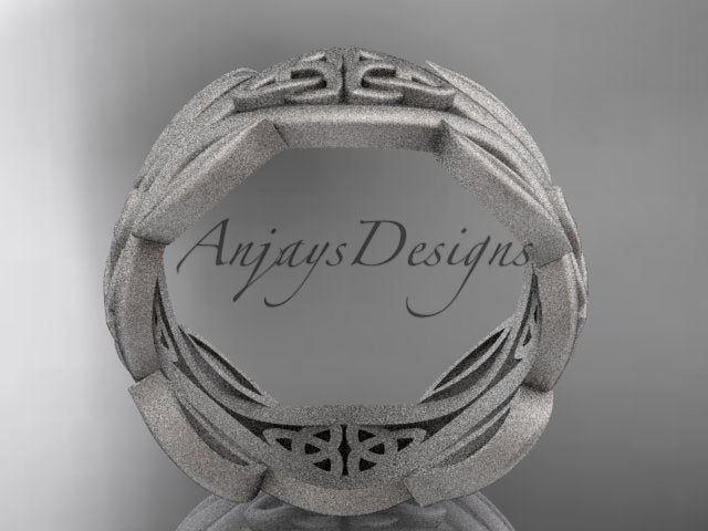 White metal matte Celtic trinity knot wedding band showing the inner band and underside details.