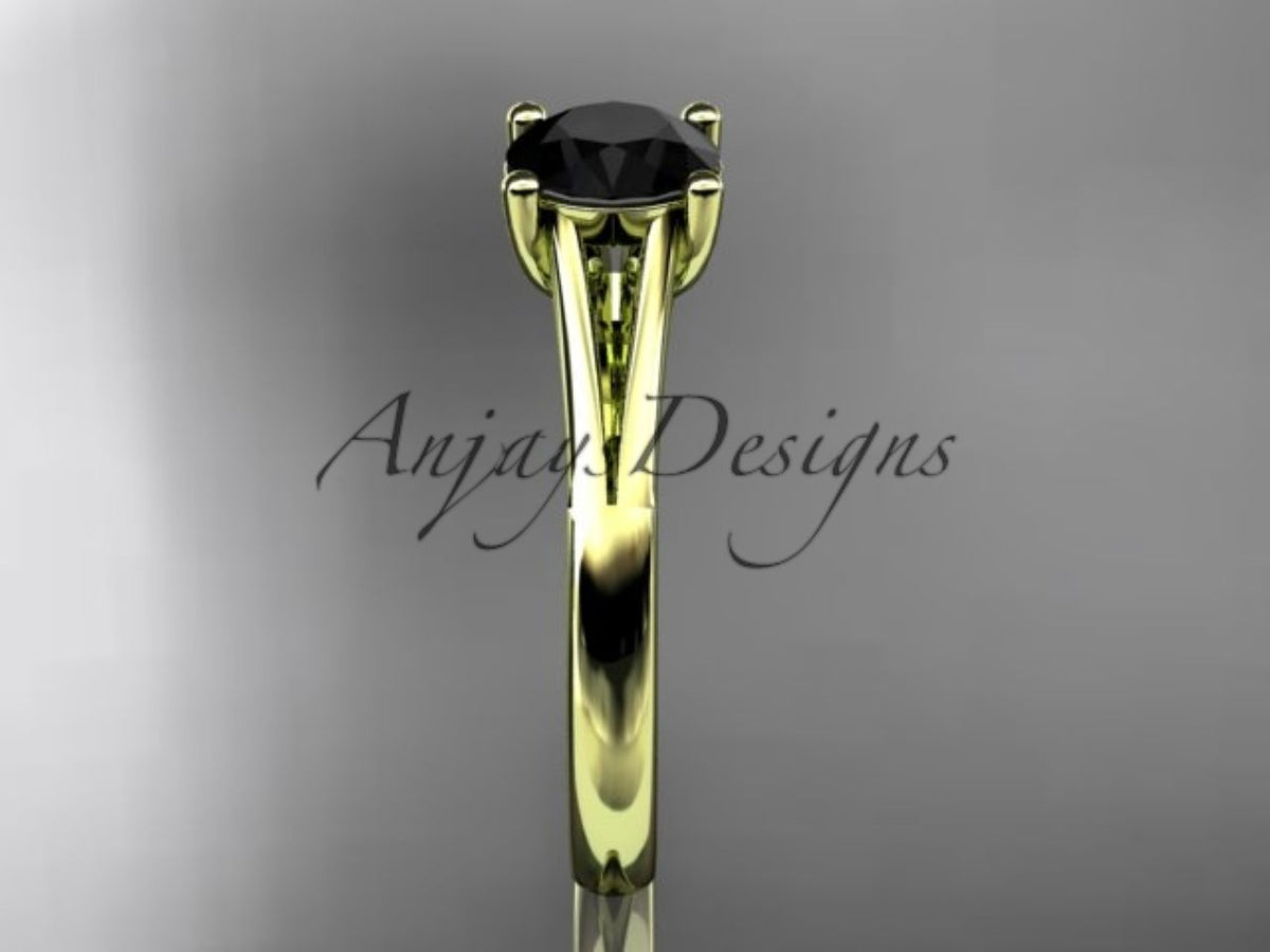Round black diamond in a sculpted yellow gold prong setting