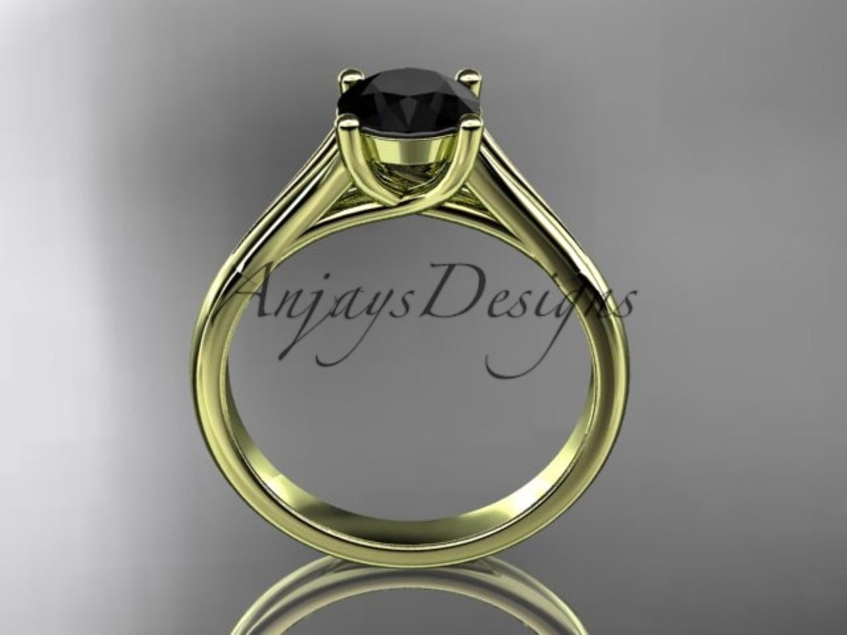 Side view of the yellow gold solitaire ring with flowing prongs