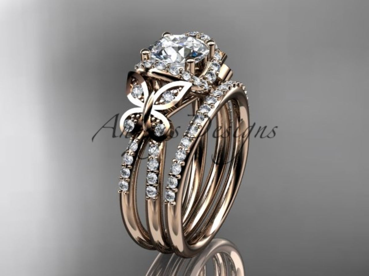 Rose gold bridal ring featuring curved bands and butterfly design