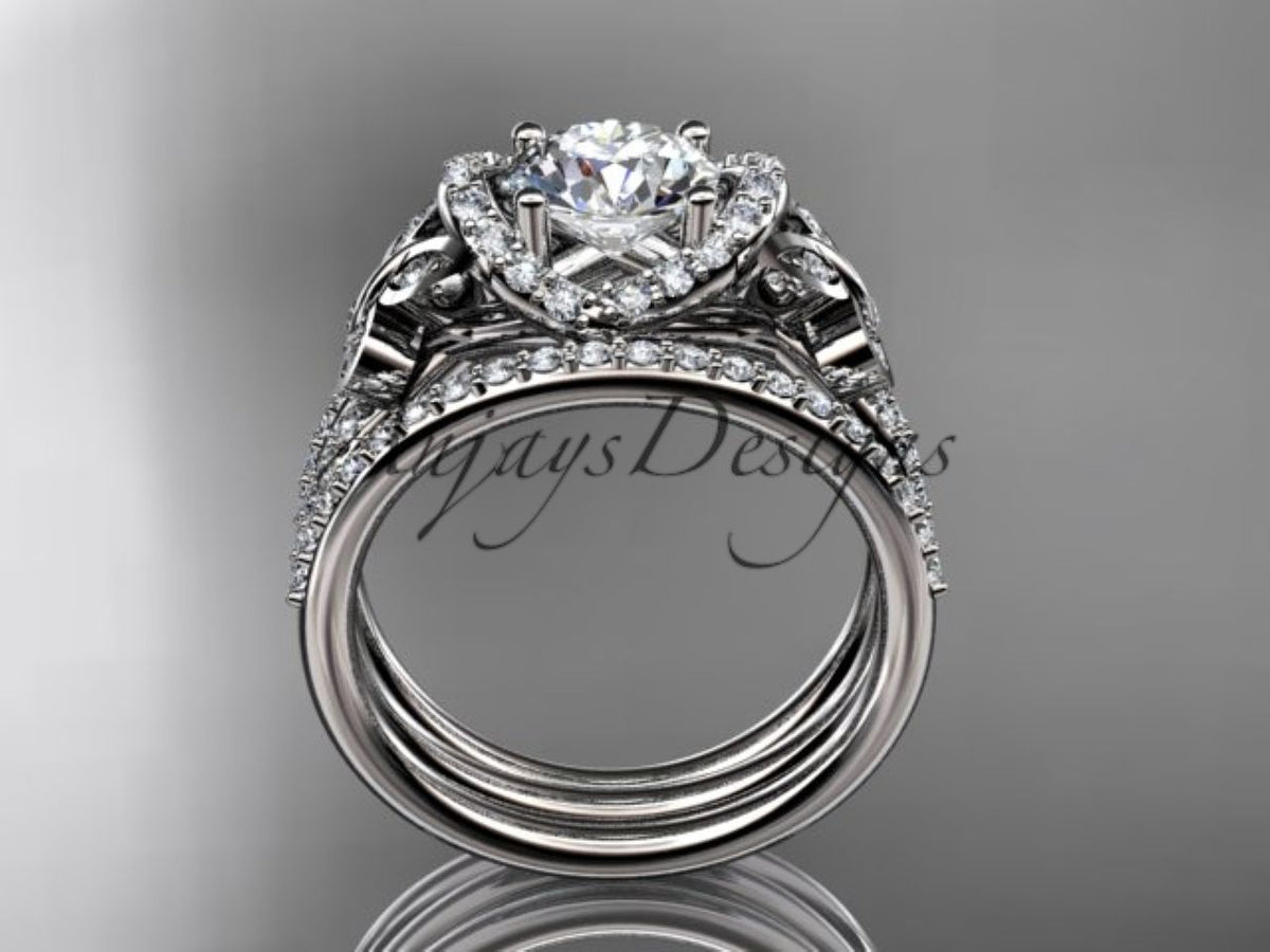 Sculpted butterfly motif on a white gold bridal ring set