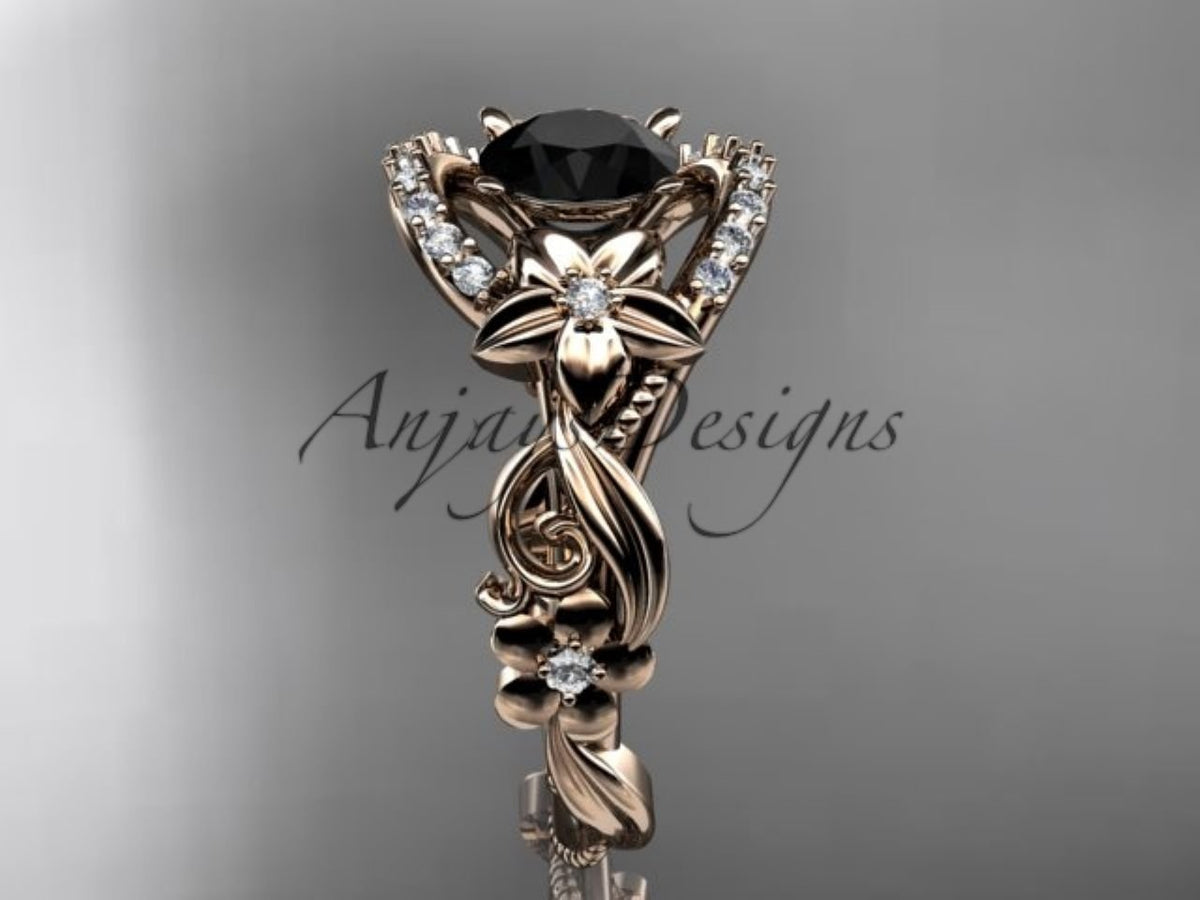 Black diamond center stone in a sculpted rose gold floral setting