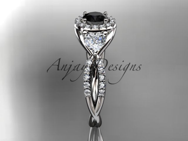 Black diamond center stone in a sculptural rose gold setting