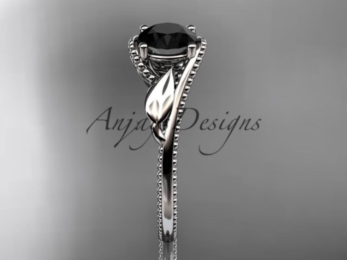 Black diamond center stone in a sculpted white gold setting