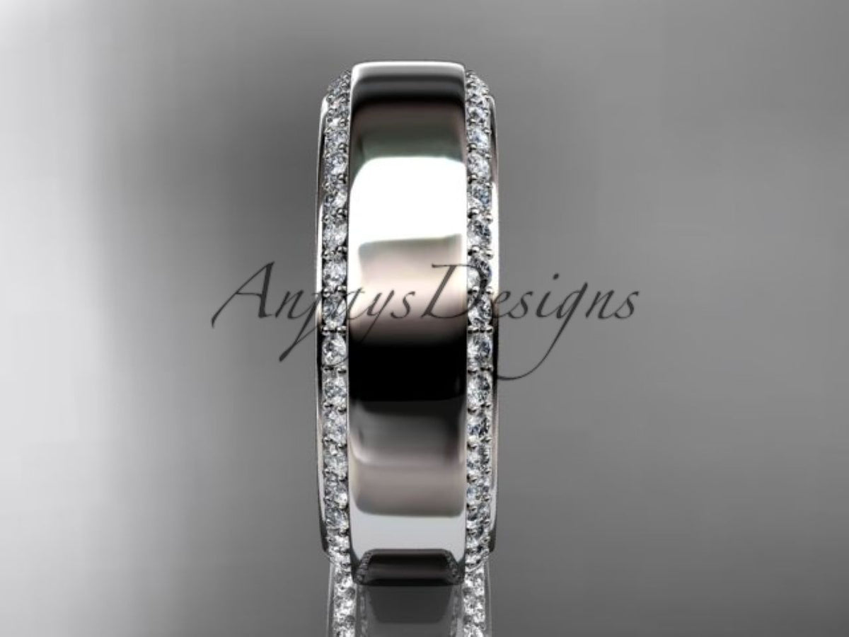Wide white gold wedding ring with diamond-accented edge