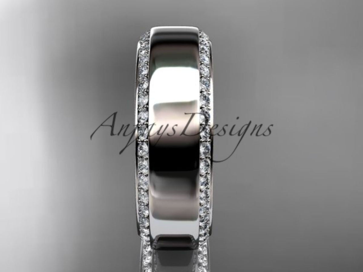 Wide white gold wedding ring with diamond-accented edge