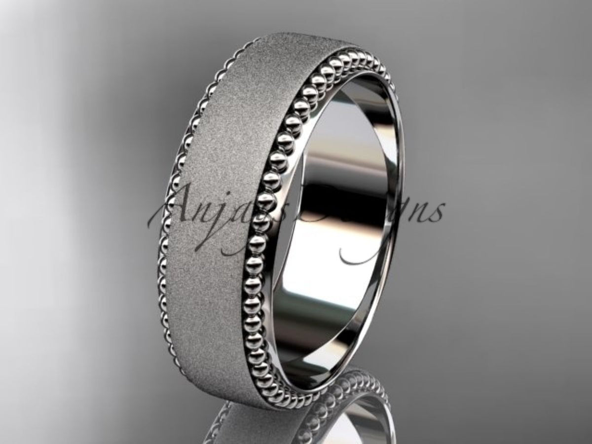 White gold wedding band featuring a wide satin matte surface