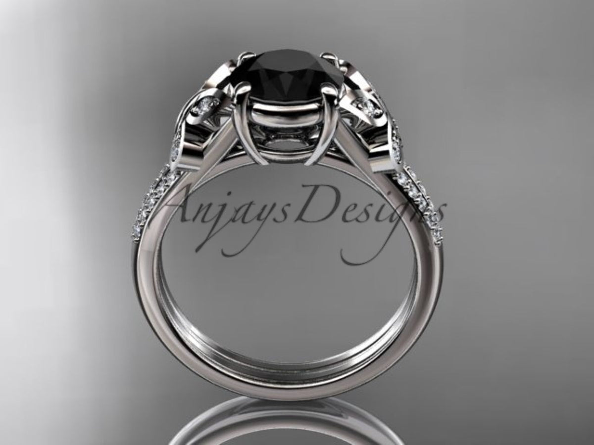 Yellow gold engagement ring with dark center stone and curved details