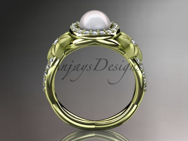 Angle shot displaying the organic leaf and vine motif running along the ring shoulders