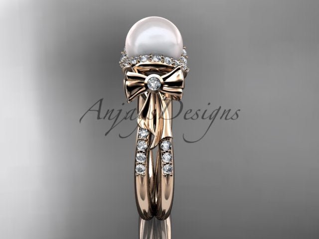On-finger showcase of the feminine 14K white gold pearl ribbon engagement ring AP155