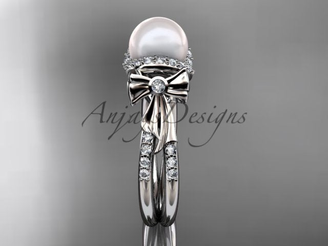 Open presentation gift box displaying the pearl and lab grown diamond engagement ring AP155