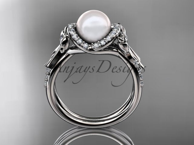 Scale and proportional view of the bow pearl engagement ring on a hand