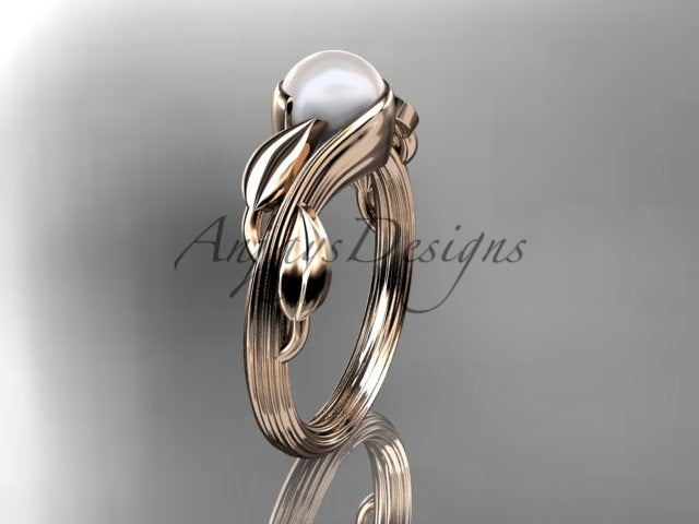 Polished white gold pearl engagement ring with botanical details