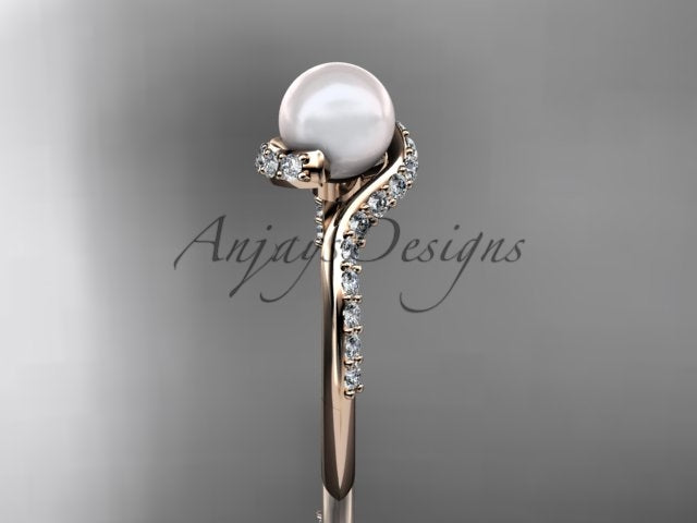 Open presentation gift box housing the yellow gold pearl engagement ring AP277