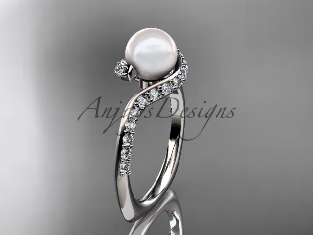Three-quarter studio angle showing polished yellow gold brilliance and pearl radiance
