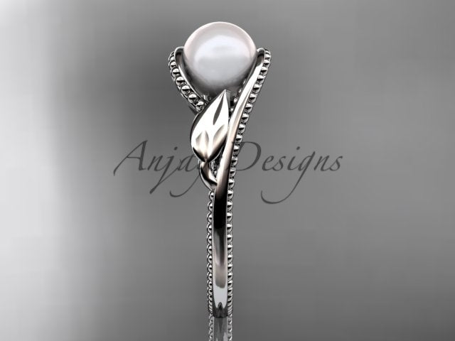 Three-quarter studio angle displaying warm rose gold luster and smooth white pearl radiance