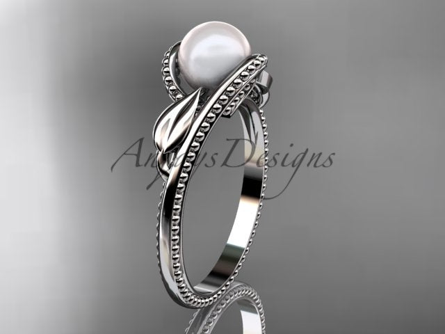 Smooth interior band construction and openwork mounting beneath the 7.0mm pearl centerpiece