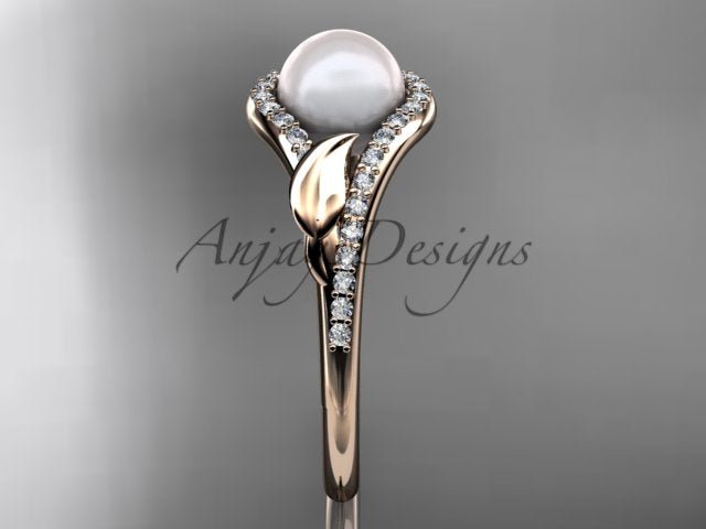 White cultured pearl set in a rose gold leaf engagement ring