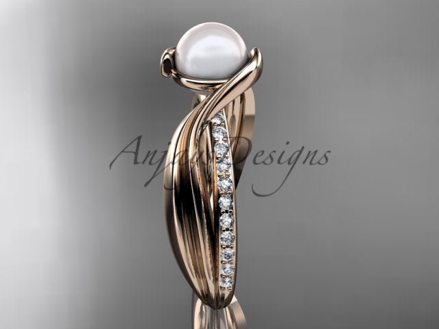 Close-up view of 6.5mm white cultured pearl cradled by interweaving rose gold strands