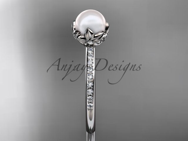 Close-up detail of 6.5mm white cultured pearl cradled in a sculpted floral petal crown setting