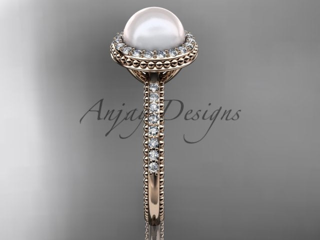 Open presentation gift box housing the white gold pearl halo engagement ring AP95