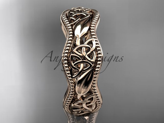 AnjaysDesigns luxury jewelry box containing 14K rose gold Celtic trinity knot band CT7190G
