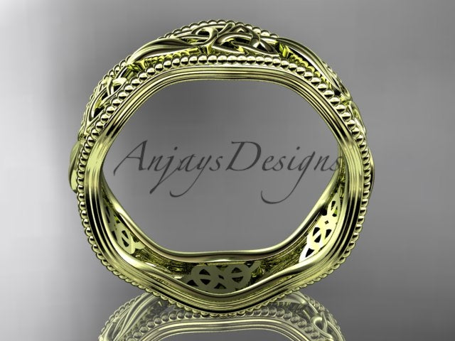 Top view of 14K yellow gold leaf pattern Celtic wedding ring CT7190G showing 7.60mm width