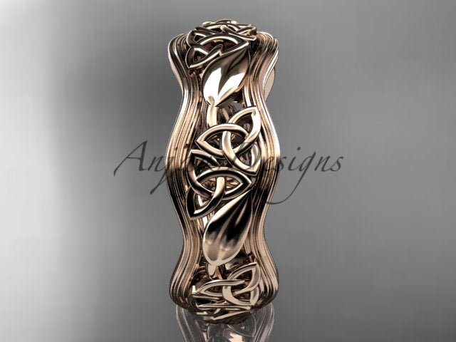 3/4 angle perspective of handcrafted 14K yellow gold Celtic engagement band CT7504G