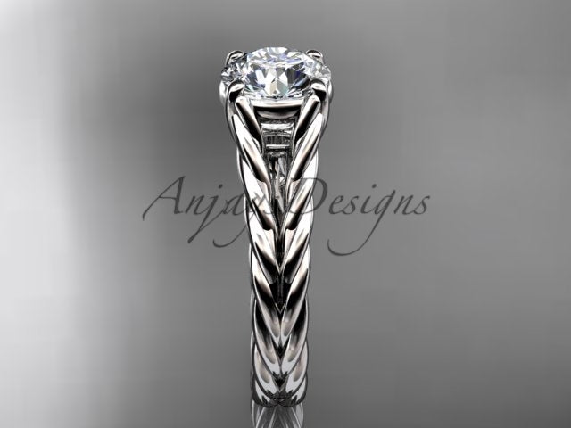 Twisted rope wedding ring with a prominent white lab grown diamond