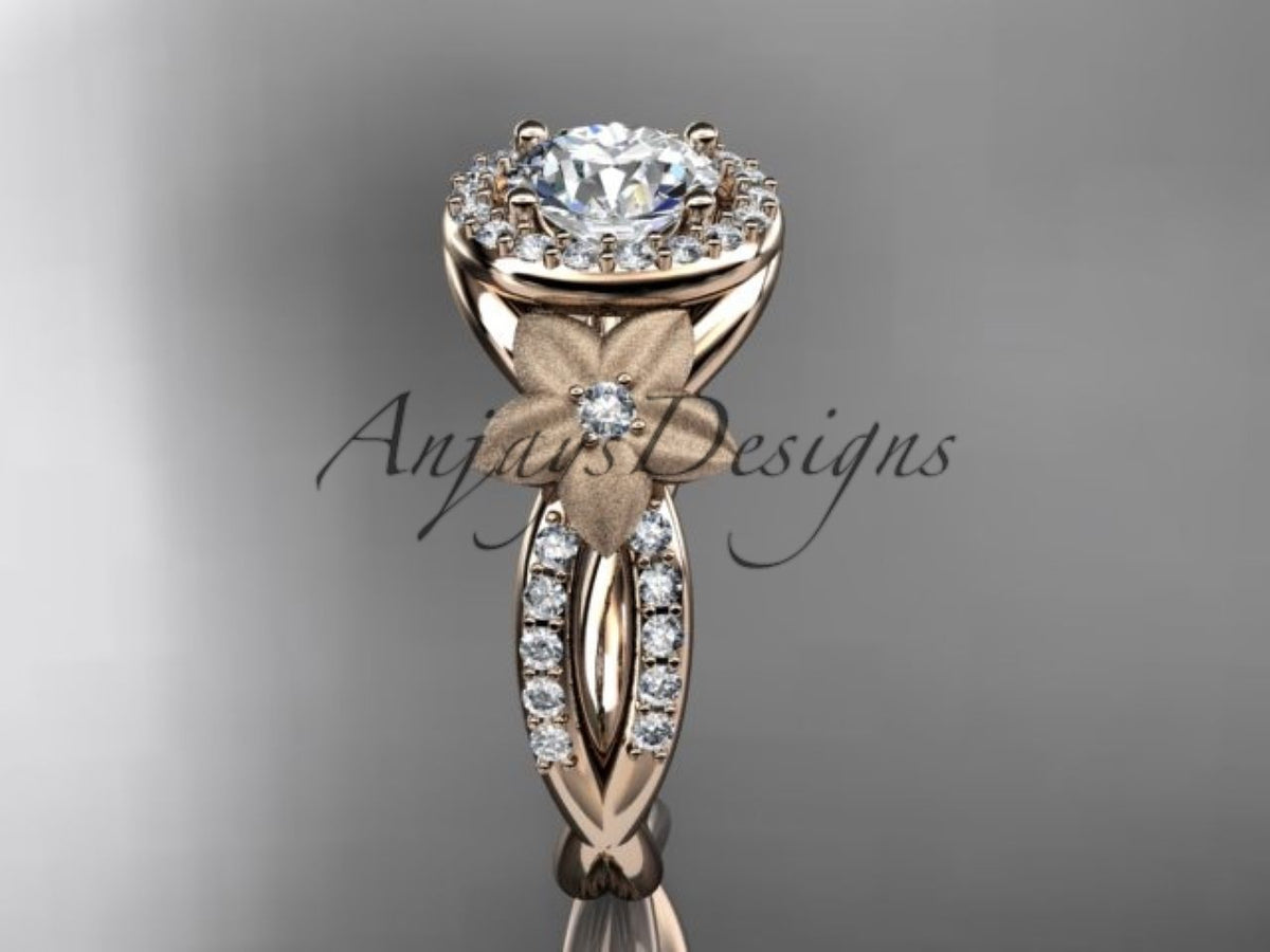 • Rose gold diamond engagement ring, style ADL127. Front view highlighting the warm rose gold metal against the white diamonds of the center halo.