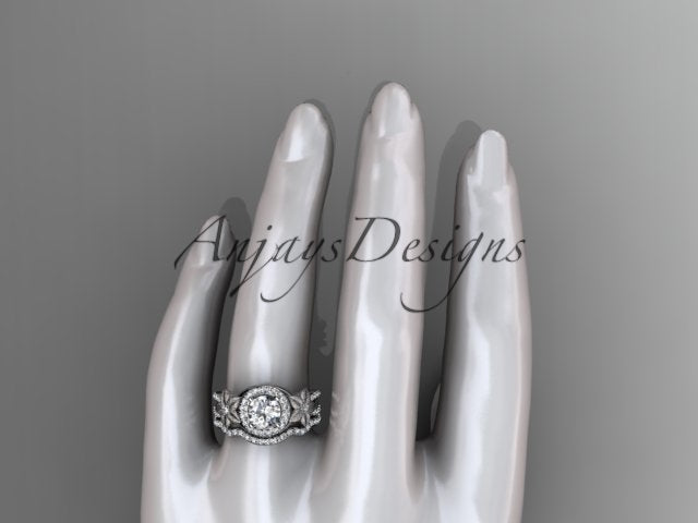 White gold diamond wedding ring set, style ADLR127S, worn on a white mannequin hand. Side view showing the height and profile of the stacked bridal set on a finger.