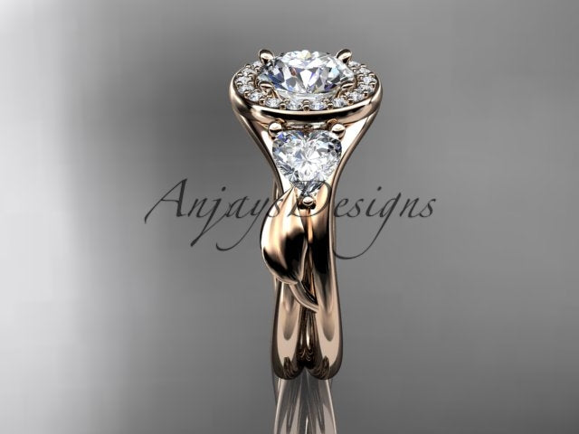 • Rose gold diamond wedding ring set, style ADLR314. Front view highlighting the unique heart-cut side diamonds and a high-polish leaf bypass band configuration.