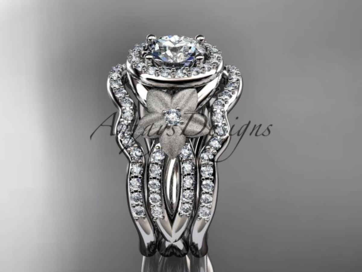 • White gold diamond wedding ring set, style ADLR444S. Front view showing the clean symmetry of the twin pave wedding bands framing the center ring's flower petal accent.