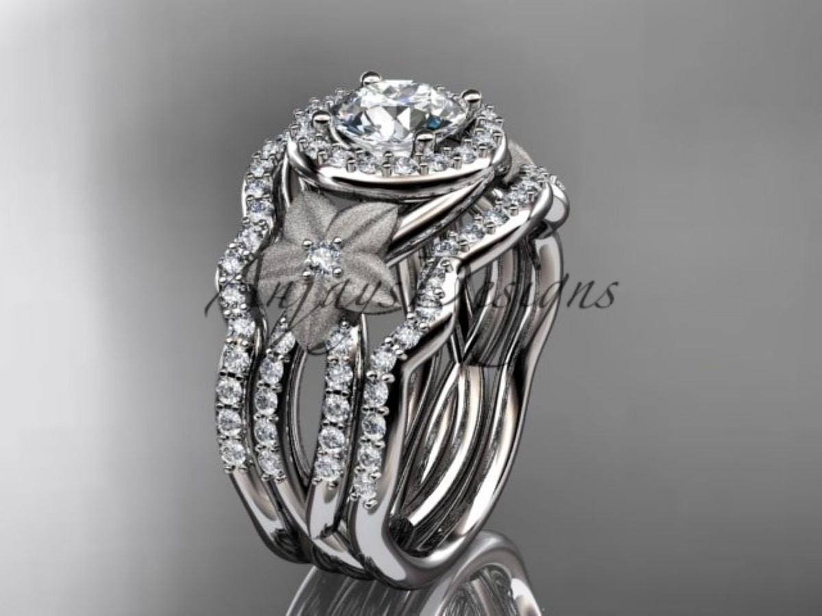 • White gold diamond wedding ring set, style ADLR444S. Three-quarter view displaying a polished white metal 3-ring stack with a round halo setting and frosted flower details.