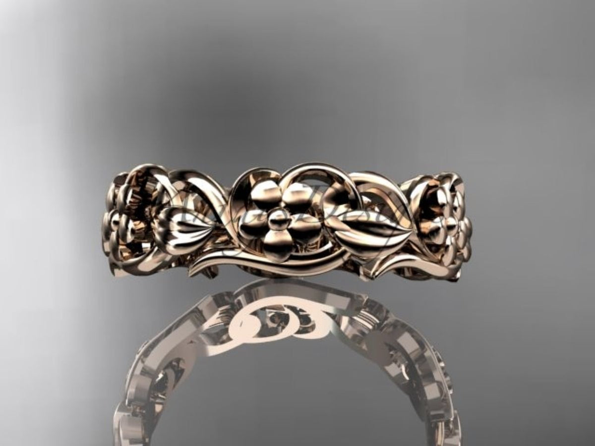 • Rose gold floral wedding band, style ADLR537G. Laid flat horizontally, showcasing the reflective metallic sheen of the polished surface.