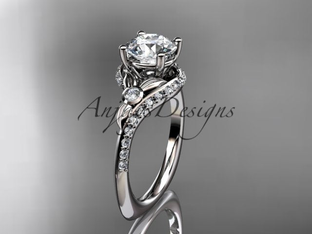 White gold diamond engagement ring, style ADLR777G. Three-quarter view displaying the polished white metal variant with sculpted leaves hugging the round brilliant center stone.