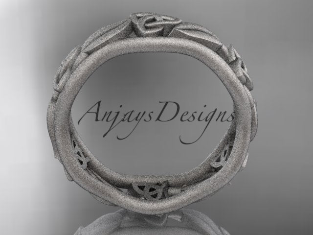 Platinum Celtic wedding band, style CT7105B. Side profile view showcasing the wavy circular shape and the detailed cutout spaces of the white platinum band.