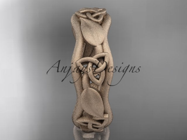 Rose gold Celtic wedding band, style CT7105B. Front view highlighting the continuous intertwined vine profile with central triquetra knots and flowing botanical leaf carvings.