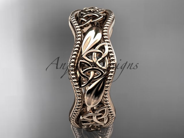 • Rose gold Celtic wedding band, style CT7508P. Front view highlighting the continuous pattern of sculpted botanical leaves woven together with intricate interlocking Celtic knots.