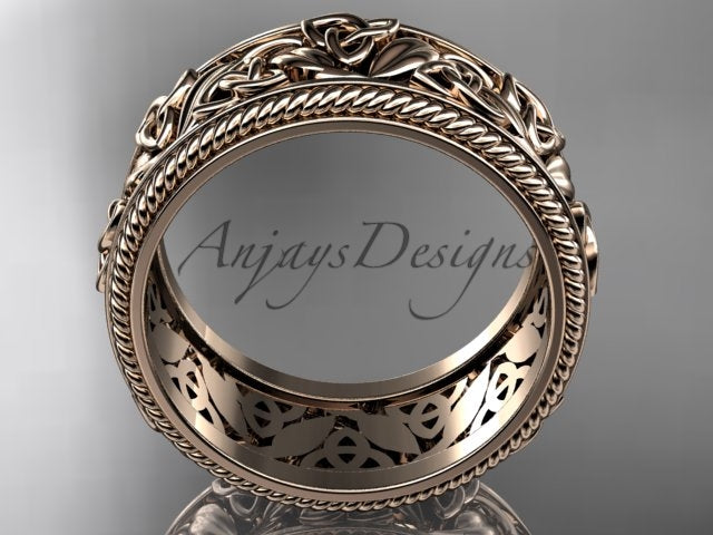 Rose gold wide Celtic wedding band, style CT7508P. Side profile view displaying the straight, substantial band profile with hollow openwork detailing along the inner lining.