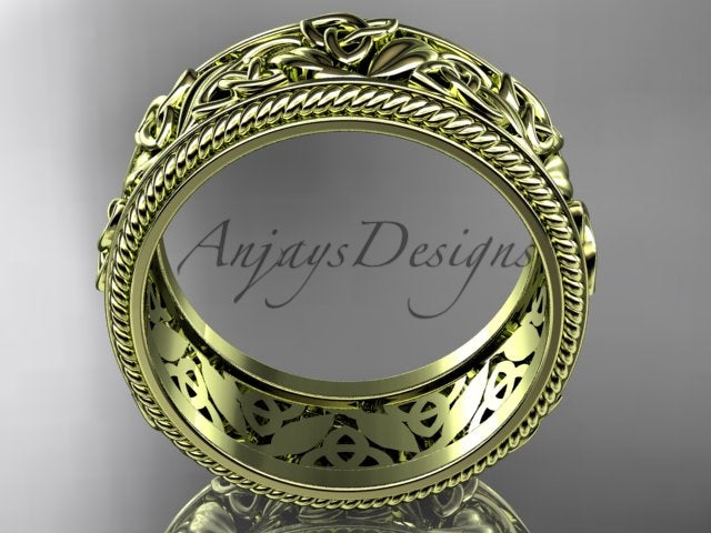 Yellow gold wide Celtic wedding band, style CT7508P. Side profile view showing the uniform circular profile of the substantial band and the hollow openwork filigree carved through the yellow gold inner lining.