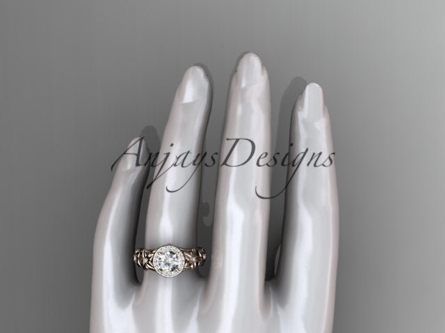 Close up of 1 carat round D VS1 lab grown diamond halo flower ring in 14k rose gold