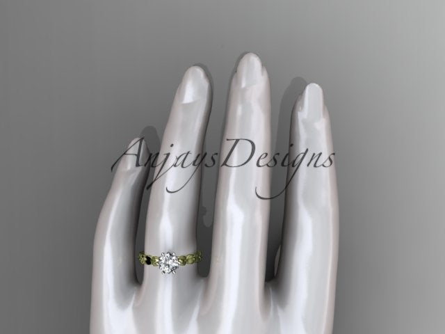 Side view of leaf inspired engagement ring with round brilliant lab grown diamond in 14k yellow gold