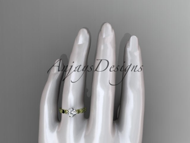 Side view of leaf inspired engagement ring with round brilliant lab grown diamond in 14k yellow gold