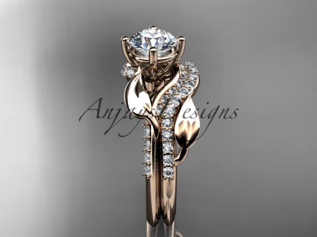 Side angle showing 1.0ct Charles & Colvard Forever One Moissanite prong setting and leaf details